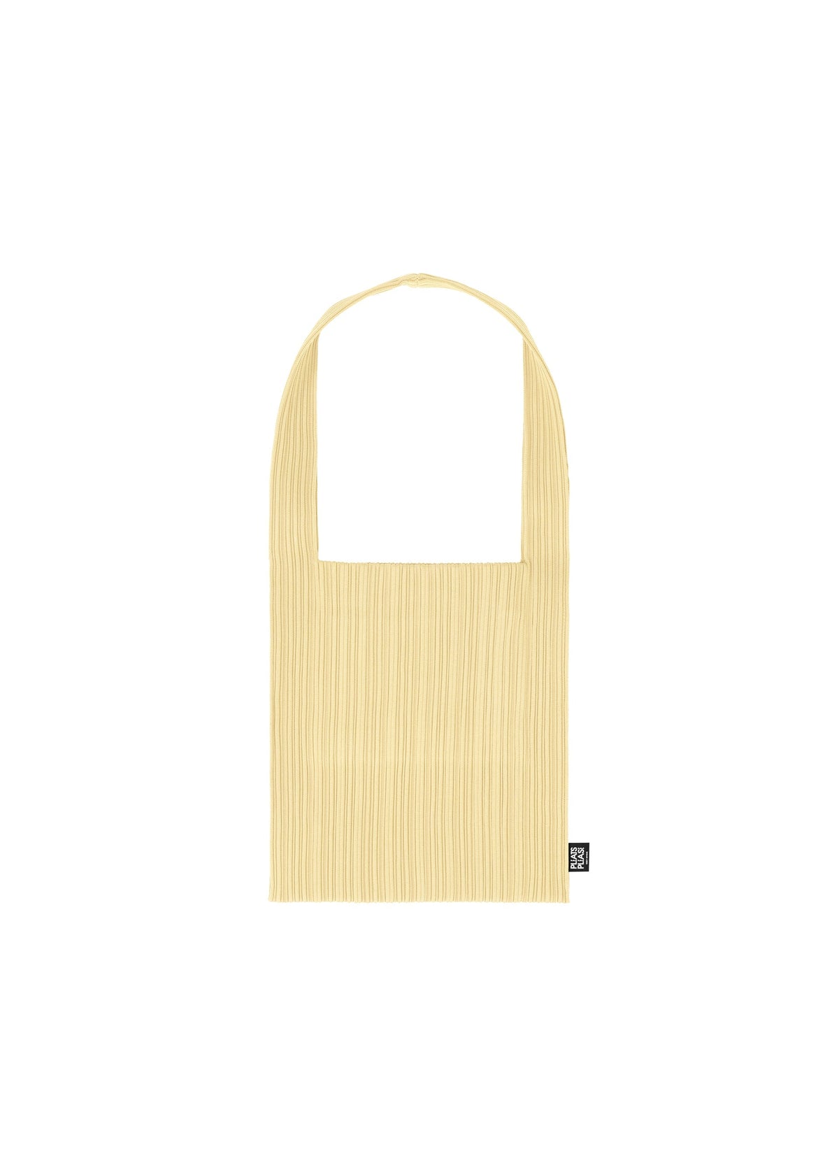 The CREPE KNIT BAG by PLEATS PLEASE ISSEY MIYAKE is a light yellow, rectangular pleated tote with a single handle, front pocket, and small black logo tag in the bottom right corner, shown against a white background. view 2 of 5