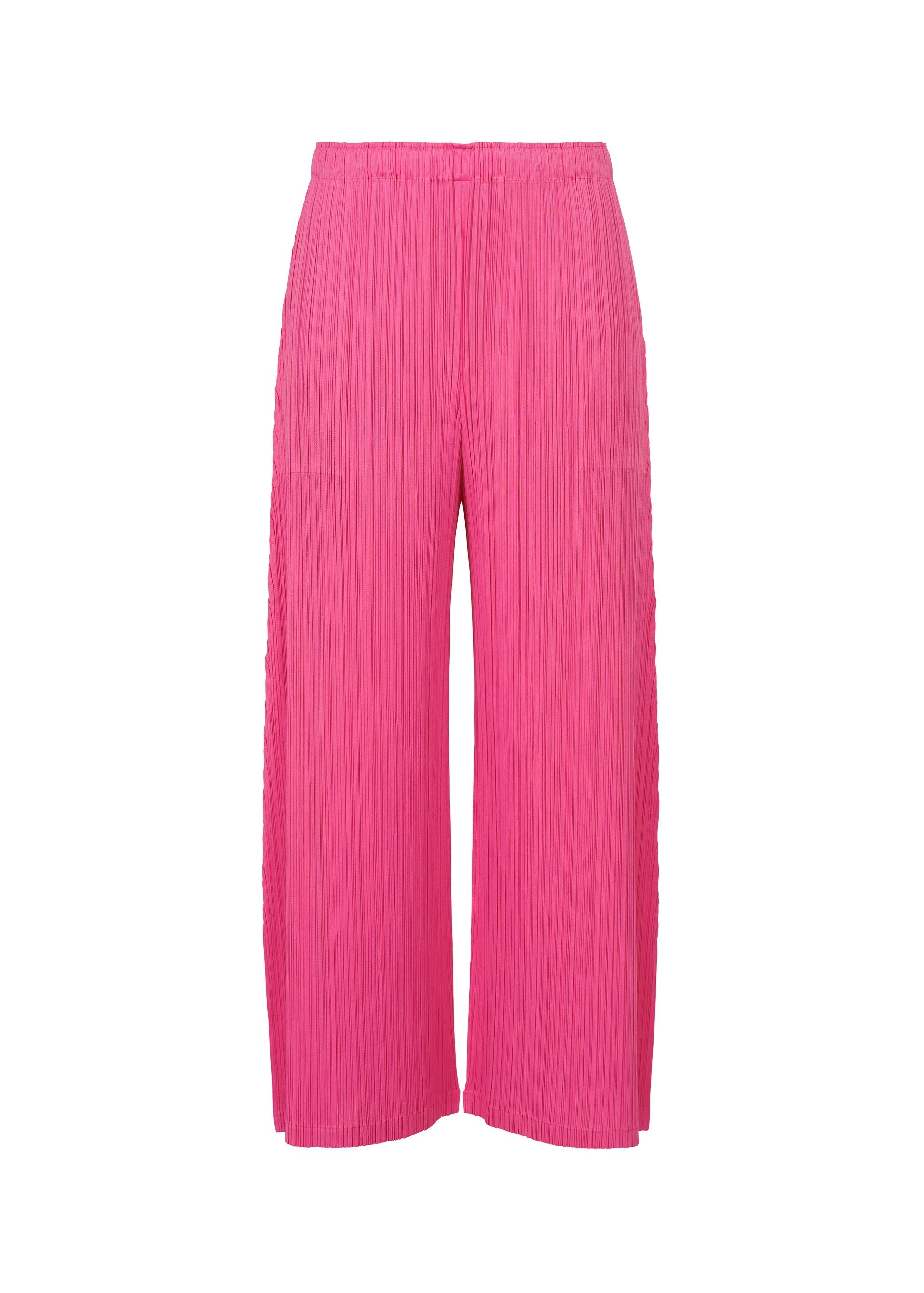 Zoomed view The MONTHLY COLORS : JANUARY wide-leg pleated pants by PLEATS PLEASE ISSEY MIYAKE feature bright pink mid-weight fabric, pockets, and an elastic waistband, shown on a plain white background. - HOT PINK （no.21）