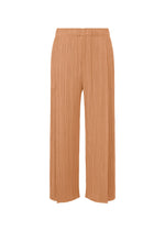MONTHLY COLORS : JUNE by PLEATS PLEASE ISSEY MIYAKE—wide-leg, high-waisted light brown tuck pants with pleats, elastic waistband, and pockets. Shown against a white background in calming coastal hues. - PINK BEIGE （no.25）