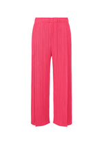 The MONTHLY COLORS : JUNE pants by PLEATS PLEASE ISSEY MIYAKE are bright pink, pleated, wide-leg, ankle-length pants with handy pockets and an elastic waistband. Displayed on a white background, they offer a relaxed fit perfect for vibrant coastal looks. - BRIGHT PINK （no.26）