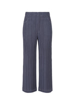 COTTON DENIM by PLEATS PLEASE ISSEY MIYAKE: Wide-leg, high-waisted pants with vertical navy and gray stripes, elastic waistband, and side pockets, shown against a white background. - NAVY (no.75)