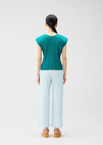 A woman with straight black hair tied back wears PLEATS PLEASE ISSEY MIYAKE's BUMPY BASKET: a teal pleated cap-sleeve top and light blue plaid straight pants with side pockets, plus beige platform sandals, against a plain white background.