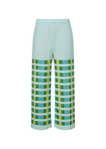 The BUMPY BASKET pants by PLEATS PLEASE ISSEY MIYAKE feature a light blue pleated design with an elastic waistband, side pockets, and horizontal stripes in blue, green, and yellow on the lower half. - GREEN （no.62）