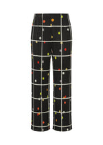 The CROSSING DOTS pants by PLEATS PLEASE ISSEY MIYAKE feature black fabric with a white plaid grid and colorful dots in red, yellow, orange, and green. Designed with pleats and a clean waist, these straight pants combine playful patterns and signature texture. - BLACK （no.15）