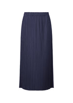 The MONTHLY COLORS : MAY skirt by PLEATS PLEASE ISSEY MIYAKE is a navy blue, pleated midi skirt with an elastic waistband, showcased against a white background. - NAVY (no.75)