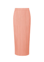 The PLEATS PLEASE ISSEY MIYAKE THICKER BOTTOMS 2 is a high-waisted, knee-length straight skirt in light peach with a pleated texture and thick fabric, shown on a white background. - CORAL PINK （no.29）