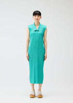 A woman faces forward against a white background, wearing the MONTHLY COLORS : MAY sleeveless pleated teal dress by PLEATS PLEASE ISSEY MIYAKE. She has straight dark hair with bangs and light platform sandals.