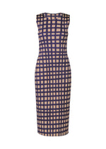 The BASKET dress by PLEATS PLEASE ISSEY MIYAKE is a sleeveless, knee-length fitted style with a round neck, featuring a beige background and bold navy blue block check print, shown against a plain white backdrop.