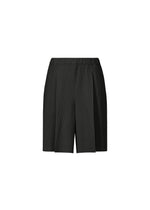 The A-POC BOTTOMS by PLEATS PLEASE ISSEY MIYAKE are black knee-length shorts with distinct pleats and an elastic waistband, displayed on a plain white background. - BLACK （no.15）