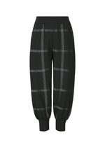 The CROSSING KNIT jogger pants by PLEATS PLEASE ISSEY MIYAKE feature a black, high-waisted ribbed design with a loose fit, white plaid pattern, and wide elastic cuffs, crafted from soft knit fabric and shown on a white background. - BLACK （no.15）