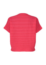 STEP KNIT by PLEATS PLEASE ISSEY MIYAKE: a bright pink short-sleeve top with horizontal textured stripes, shown from the back against a white background. Crafted in soft organic cotton knit for a relaxed, breezy summer look.