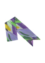 The PLAYGROUND SCARF by PLEATS PLEASE ISSEY MIYAKE features bold geometric pleats in purple, green, yellow, and white, displayed against a white background. - PURPLE （no.81）