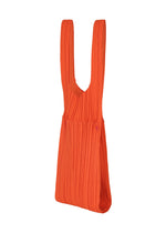 The PLEATS BRIDGE BAG by PLEATS PLEASE ISSEY MIYAKE features textured, bright orange fabric with vertical pleats and a unique design, shown against a plain white background. - RED （no.24）