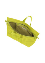 The PLEATS BOSTON BAG by PLEATS PLEASE ISSEY MIYAKE is a bright yellow-green zippered bag with vertical textured lines, an oblong shape, and a beige-lined interior with an inner zippered pocket shown from above.