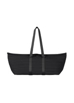 The PLEATS BOSTON BAG by PLEATS PLEASE ISSEY MIYAKE is a large, oblong black tote with long handles and a horizontally pleated texture. Minimalist and unadorned, it is shown against a white background. - BLACK （no.15）
