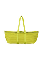 The PLEATS BOSTON BAG by PLEATS PLEASE ISSEY MIYAKE is a large yellow tote with long handles and a ribbed, pleated exterior, shown on a white background. - YELLOW GREEN （no.64）