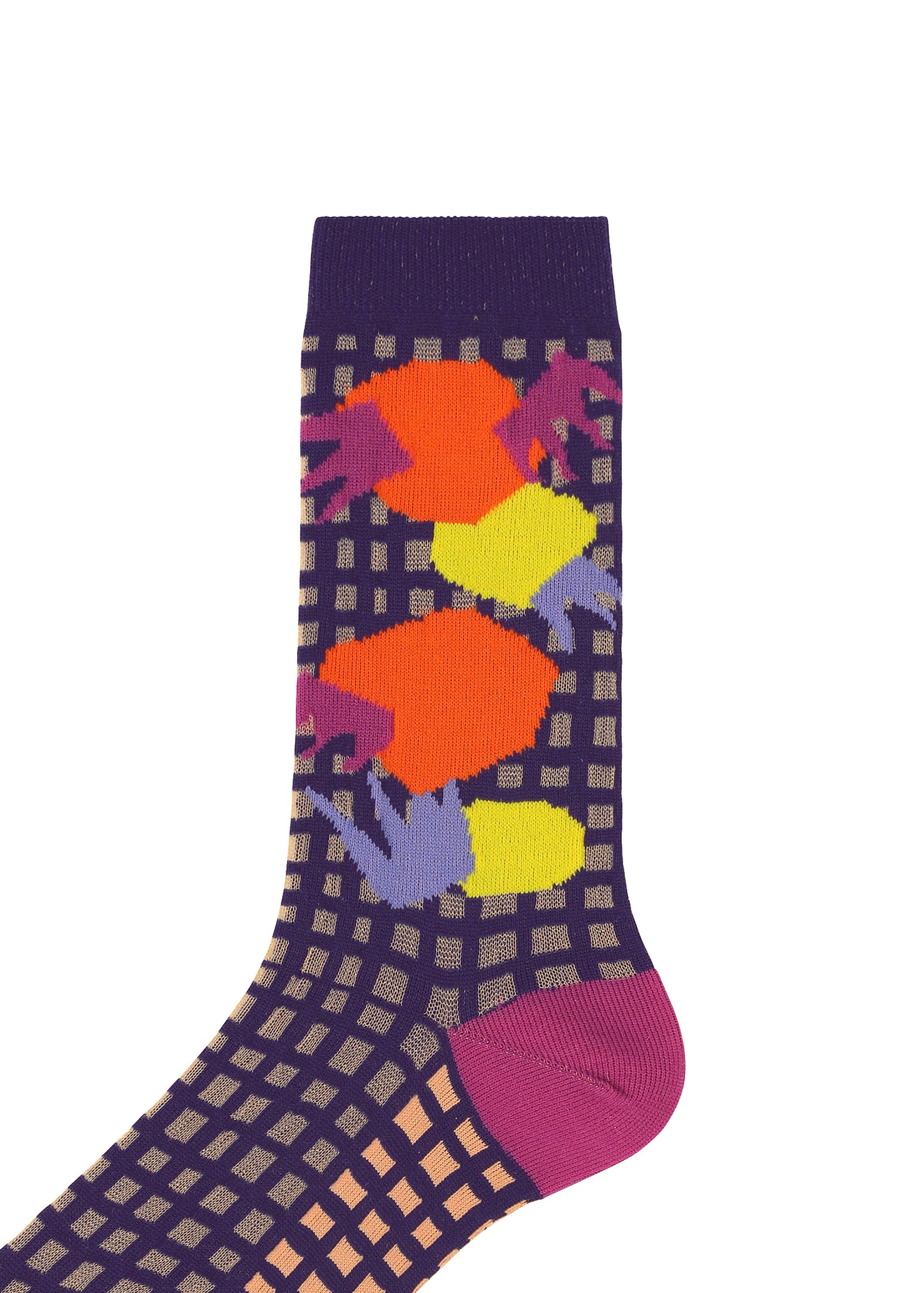 Zoomed view The MARKET SOCKS by PLEATS PLEASE ISSEY MIYAKE feature a beige and purple grid pattern with abstract orange, red, yellow, and purple shapes on the upper part and a solid magenta toe.