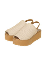 The PLEATS KNIT SANDALS by PLEATS PLEASE ISSEY MIYAKE feature beige ribbed knit uppers, tan slingback straps, subtle pleats, and thick light brown chunky soles. - LIGHT BEIGE （no.39）