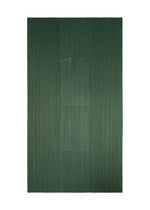 A textured green rectangular surface from PLEATS PLEASE ISSEY MIYAKE’s FLUTTER collection, featuring a subtle embossed outline of a sleeveless shirt and pants at the center, evoking the appearance of a draped vest crafted with unique fabric design.