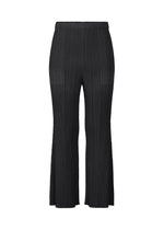 The MONTHLY COLORS : JULY pants by PLEATS PLEASE ISSEY MIYAKE feature a black, wide-leg pleated flare design with pockets and an elastic waistband, shown against a white background. - BLACK （no.15）