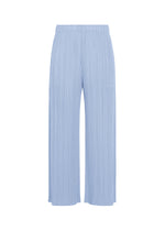 The MONTHLY COLORS : AUGUST pants by PLEATS PLEASE ISSEY MIYAKE feature a light blue hue, high-waisted wide-leg silhouette, pleated texture, and an elastic waistband—offering vibrant color and airy comfort perfect for summer. Shown on a white background. - LIGHT BLUE （no.70）