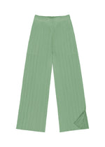 MONTHLY COLORS : AUGUST wide-leg pleated pants by PLEATS PLEASE ISSEY MIYAKE, shown in a light green with a subtly crinkled texture and laid flat against a white background—effortless summer style in fresh, vibrant color.
