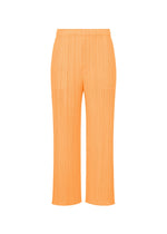 The MONTHLY COLORS : SEPTEMBER pants by PLEATS PLEASE ISSEY MIYAKE, featuring orange pleats, a straight leg cut, gentle tones, an elastic waistband, and no visible pockets, are displayed against a plain white background for a balanced color composition. - NEON ORANGE （no.31）