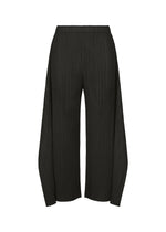 MONTHLY COLORS : SEPTEMBER wide-leg black pleated trousers by PLEATS PLEASE ISSEY MIYAKE, shown on a white background. These flare pants feature a distinctive, sculptural silhouette with an elastic waistband and extra fabric forming a dramatic shape at the ankles. The refined color composition and gentle tones contribute to their modern appeal. - BLACK （no.15）