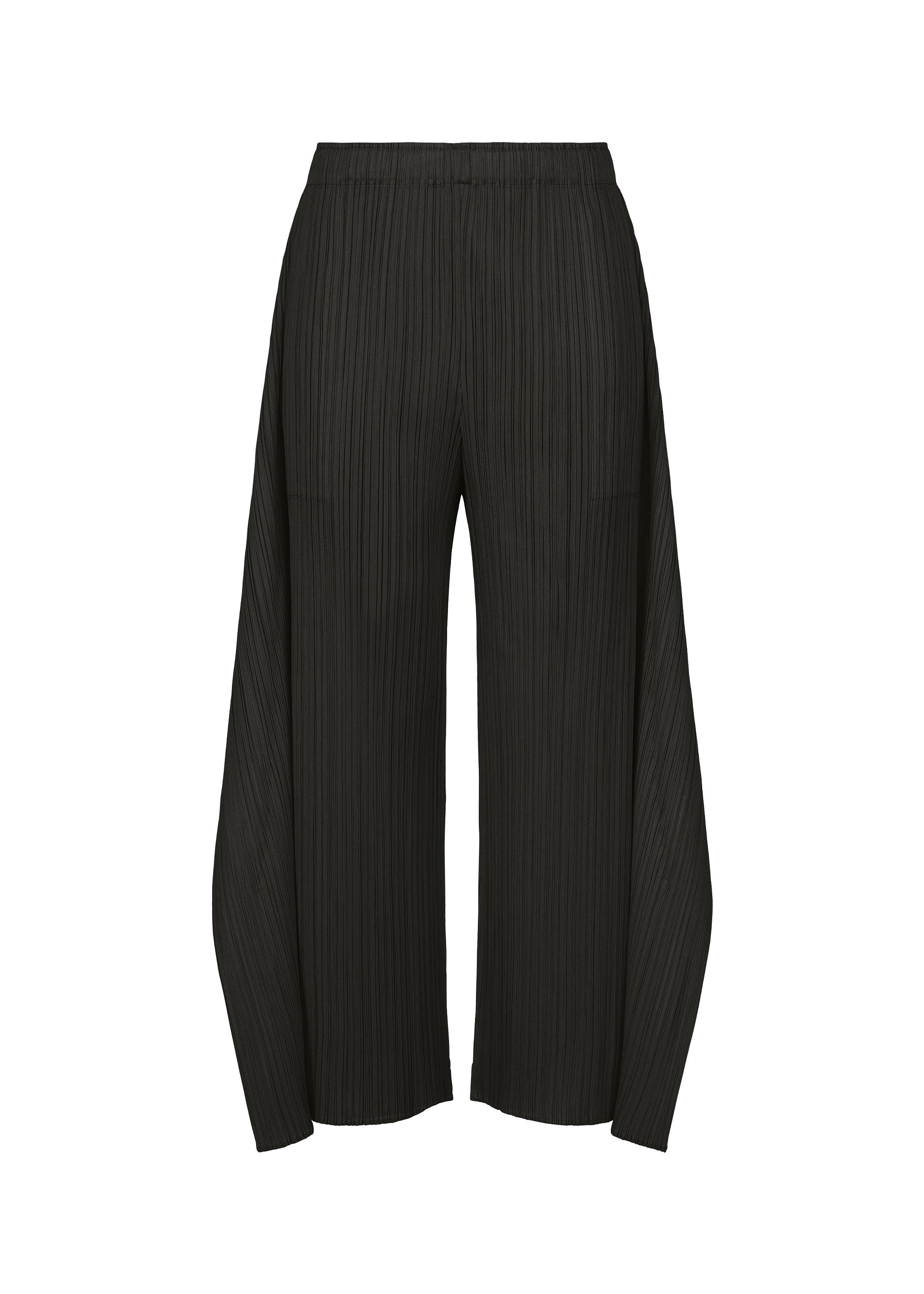 Zoomed view MONTHLY COLORS : SEPTEMBER wide-leg black pleated trousers by PLEATS PLEASE ISSEY MIYAKE, shown on a white background. These flare pants feature a distinctive, sculptural silhouette with an elastic waistband and extra fabric forming a dramatic shape at the ankles. The refined color composition and gentle tones contribute to their modern appeal. - BLACK （no.15）