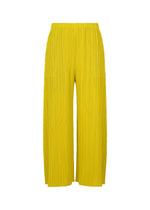 MONTHLY COLORS : OCTOBER by PLEATS PLEASE ISSEY MIYAKE—yellow pleated wide-leg pants with color planes and an elastic waistband, styled on a white background. - YELLOW OCHER （no.55）