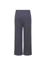 COTTON DENIM by PLEATS PLEASE ISSEY MIYAKE: Wide-leg, ankle-length dark gray cotton pants with a denim-like look, vertical ribbed texture, elastic waistband, and no visible pockets or fastenings. Displayed on white background.