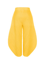 THICKER BOTTOMS 1 by PLEATS PLEASE ISSEY MIYAKE are bright yellow, high-waisted pleated wide-leg pants with a sculptural curved silhouette, made from thick fabric with practical pockets and shown on a white background.