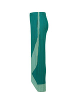 Side view of the TWIRL pants by PLEATS PLEASE ISSEY MIYAKE in teal, featuring a lighter mint green diagonal stripe and hem detail, convenient side pockets, and a subtle wrapping design inspired by norimaki sushi, set against a white background.