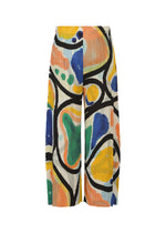 The ROLL pants by PLEATS PLEASE ISSEY MIYAKE feature wide-leg pleats and a bold abstract print in black, yellow, blue, green, and orange on white with curved lines and organic shapes for an artistic, eye-catching look.