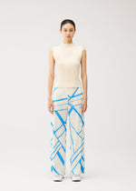 A woman stands facing forward, wearing the FOLD LINE sleeveless cream top and wide-leg trousers with a blue geometric pattern by PLEATS PLEASE ISSEY MIYAKE, featuring a minimalist design. Her hair is tied back, and she is wearing white shoes against a plain, light-colored background.