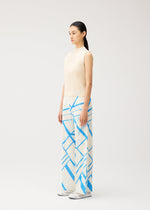 A woman stands sideways against a plain light background, dressed in the FOLD LINE set from PLEATS PLEASE ISSEY MIYAKE—a sleeveless beige top and wide, straight pants adorned with blue geometric patterns and a subtle diagonal wrapping effect—finished with white shoes for a perfect minimalist look.