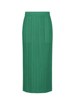 The THICKER BOTTOMS 1 skirt by PLEATS PLEASE ISSEY MIYAKE is a green, midi-length straight skirt with pleated texture, crafted from thick fabric. It features an elastic waistband, subtle pockets, and is shown on a plain white background. - FRESH GREEN （no.67）