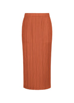 The THICKER BOTTOMS 2 skirt from PLEATS PLEASE ISSEY MIYAKE is a straight, rust-colored midi crafted from thick, pleated fabric with convenient side pockets, displayed against a white background. - TERRACOTTA （no.45）