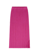 The THICKER BOTTOMS 2 skirt by PLEATS PLEASE ISSEY MIYAKE is a vibrant pink, knee-length pleated piece made from thick fabric, featuring subtle side pockets and a soft fold detail at the bottom right corner, shown against a white background.