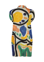 The ROLL tunic by PLEATS PLEASE ISSEY MIYAKE features a sleeveless, high-neck design with pleated white fabric and a vibrant abstract print in yellow, blue, orange, green, and black.