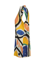 The ROLL tunic by PLEATS PLEASE ISSEY MIYAKE is a sleeveless, high-neck piece with a side cutout and pleated texture, showcasing a vibrant abstract print in yellow, blue, orange, green, and black on white.