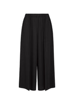 The A-POC BOTTOMS by PLEATS PLEASE ISSEY MIYAKE are black, mid-length wide-leg culotte pants crafted from a textured fabric with an A-POC structure and feature an elastic waistband. The pants, which end below the knee, are displayed against a white background. - BLACK （no.15）