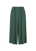 The A-POC BOTTOMS by PLEATS PLEASE ISSEY MIYAKE are green, wide-legged pleated culotte pants featuring an elastic waistband and a distinctive A-POC structure, shown against a white background. - MOSS GREEN （no.68）