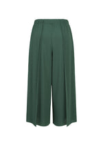 A-POC BOTTOMS by PLEATS PLEASE ISSEY MIYAKE in dark green, featuring wide-leg culottes with an elastic waistband and subtle vertical texture enhanced by a touch of A-POC structure, shown against a plain white background.