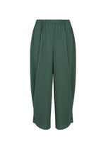 A-POC BOTTOMS by PLEATS PLEASE ISSEY MIYAKE, dark green loose-fitting cropped pleated pants featuring an elastic waistband and subtle vertical texture, displayed on a plain white background.
