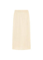 The A-POC BOTTOMS by PLEATS PLEASE ISSEY MIYAKE is a beige, knee-length skirt with a straight cut and subtle textured fabric, featuring discreet pockets for added convenience, shown against a plain white background. - WHITE （no.01）