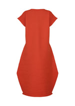 The ZIG ZAG KNIT dress by PLEATS PLEASE ISSEY MIYAKE is shown on a white background, featuring a red color, short sleeves, a round neckline, textured ribbed fabric, and an oversized geometric silhouette.