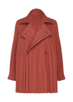 The SMOOTH COAT by PLEATS PLEASE ISSEY MIYAKE is a rust-colored, pleated trench coat featuring wide lapels, double-breasted buttons, and long sleeves. Crafted from thick fabric for chilly seasons, it is displayed on a plain white background.