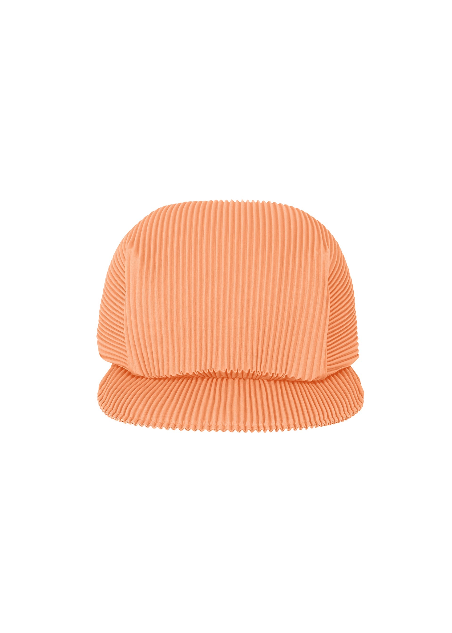 Zoomed view The PLEATS CAP by PLEATS PLEASE ISSEY MIYAKE is peach-colored with pleats, a soft ribbed texture, and a wide structured brim, shown against a white background.