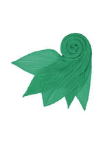 The MONTHLY SCARF JULY by PLEATS PLEASE ISSEY MIYAKE is a green pleated scarf, spiraled with leaf-like points on a white background, radiating playful pop-art vibrancy.